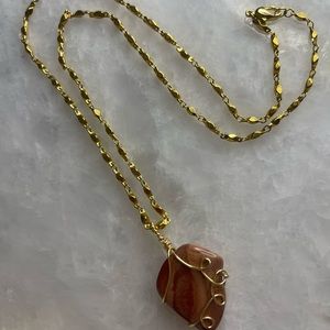 Faith-Natural stone reversible pendant wrapped in Gold tone with chain.
